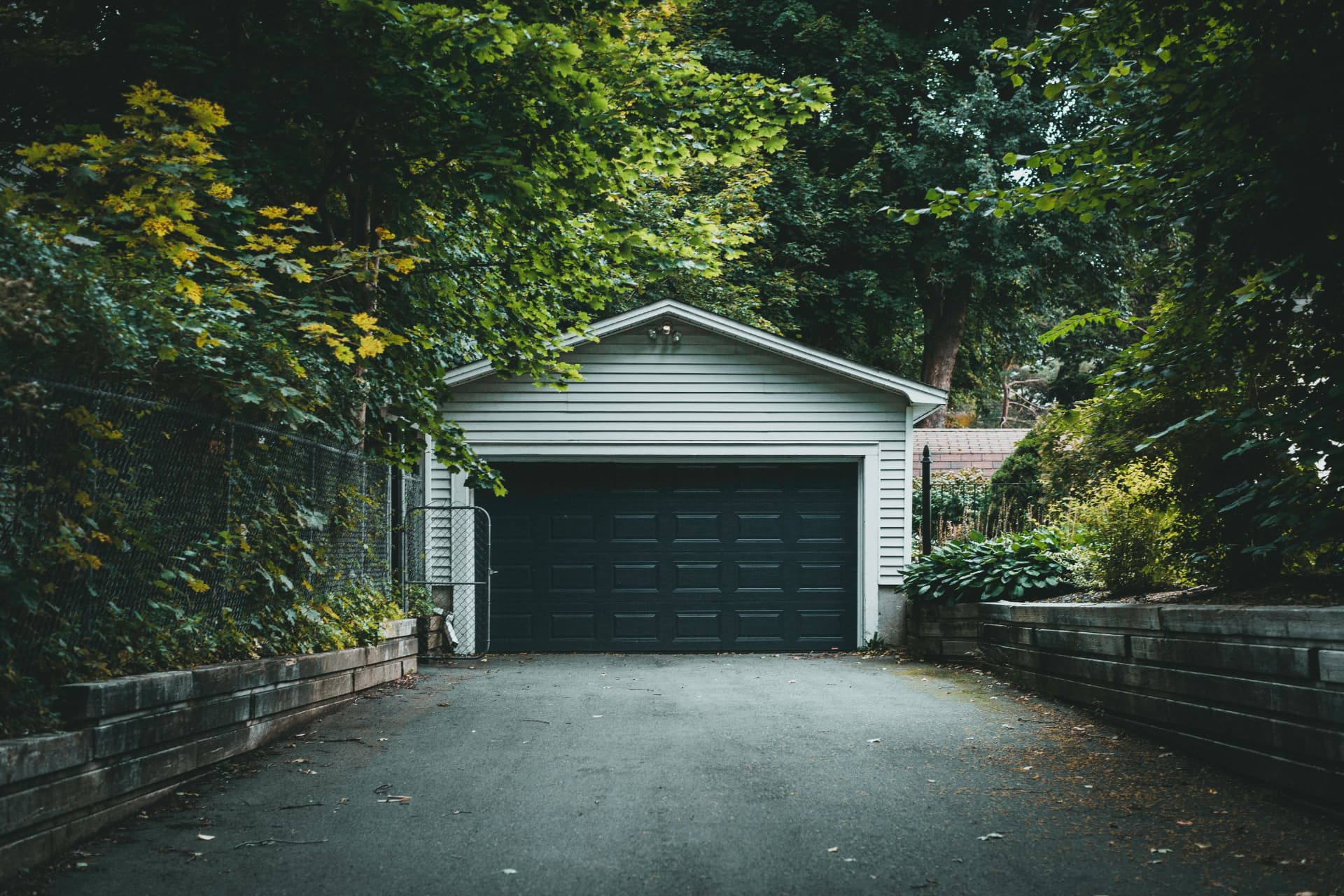 Contemporary dark-paneled residential garage door