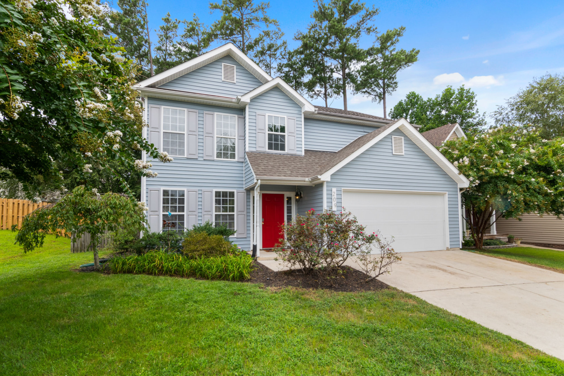 Garage doors on a welcoming family home